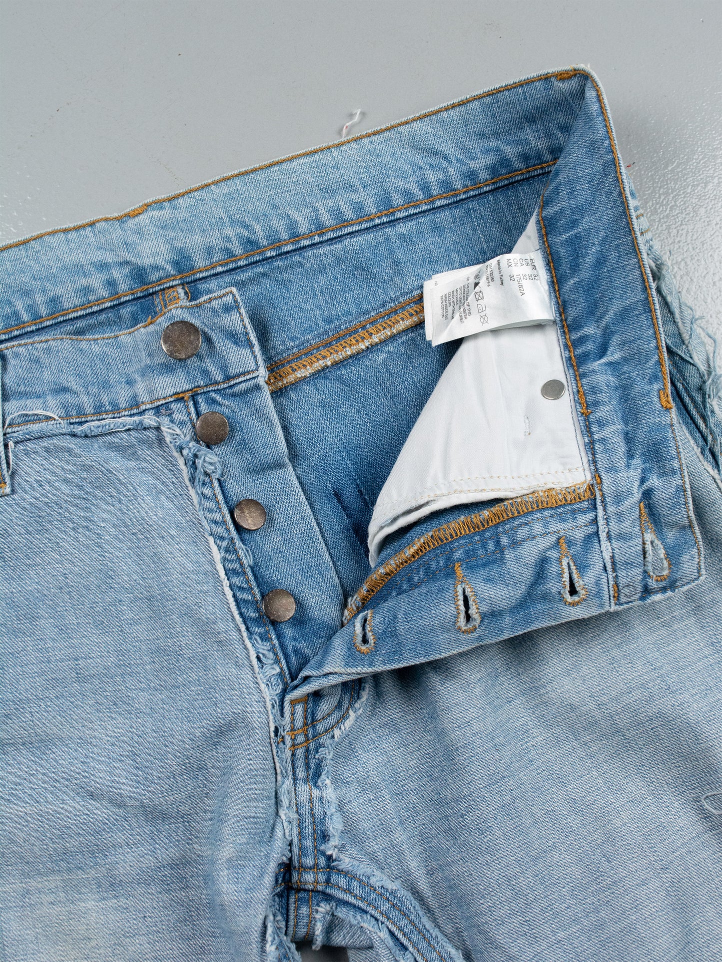 2012 H&M X Maison Martin Margiela SS05 reversed-denim jeans - size 32