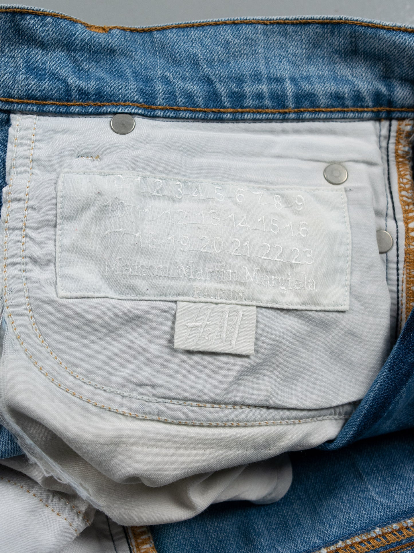 2012 H&M X Maison Martin Margiela SS05 reversed-denim jeans - size 32